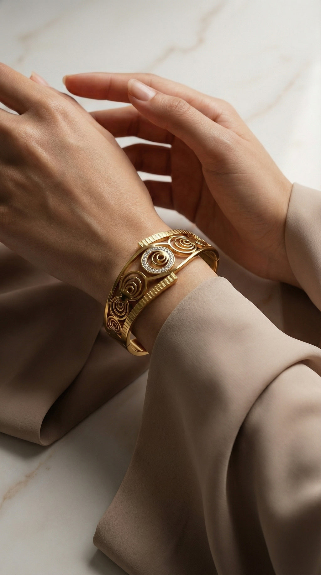 Luxury Spiral Medallion Bangle in Gold Stainless Steel
