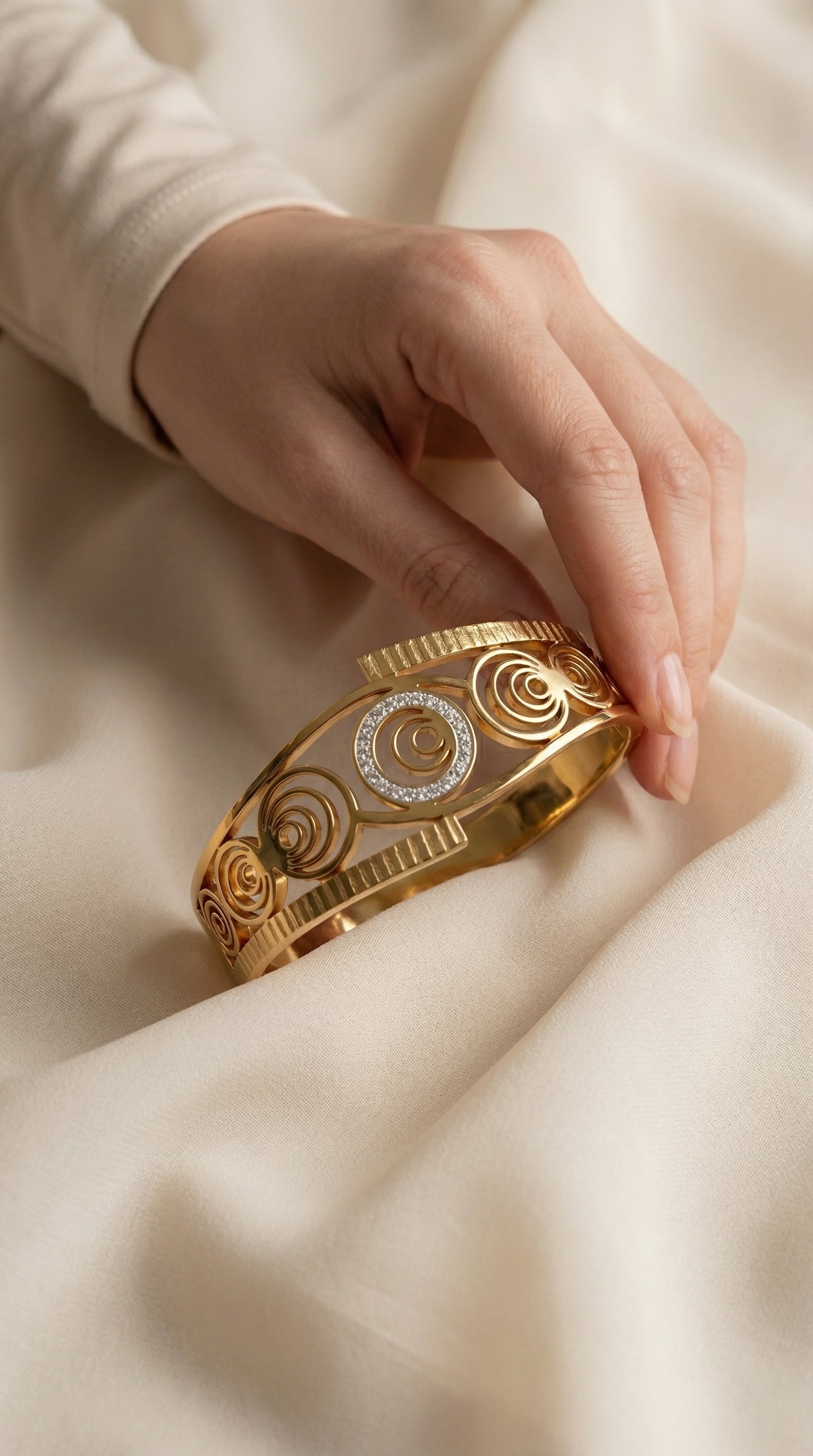 Luxury Spiral Medallion Bangle in Gold Stainless Steel