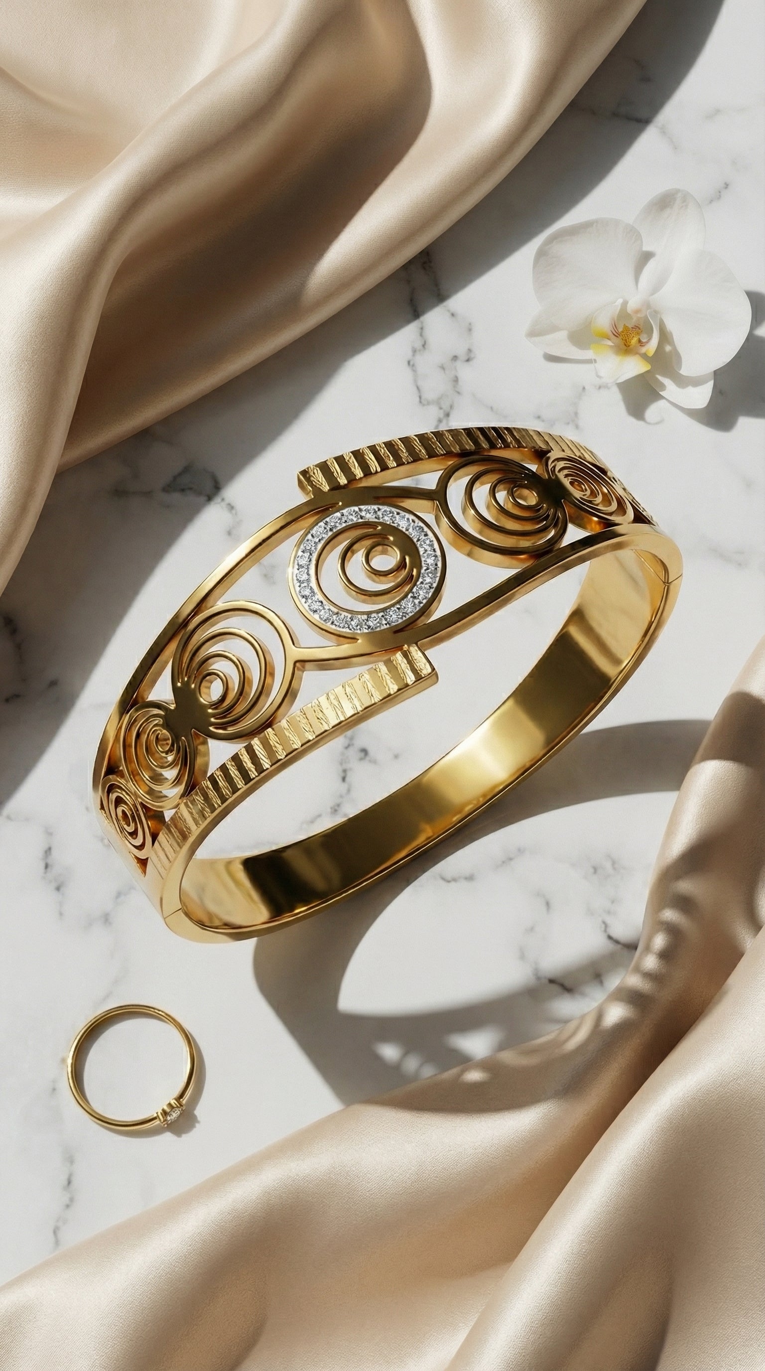 Luxury Spiral Medallion Bangle in Gold Stainless Steel