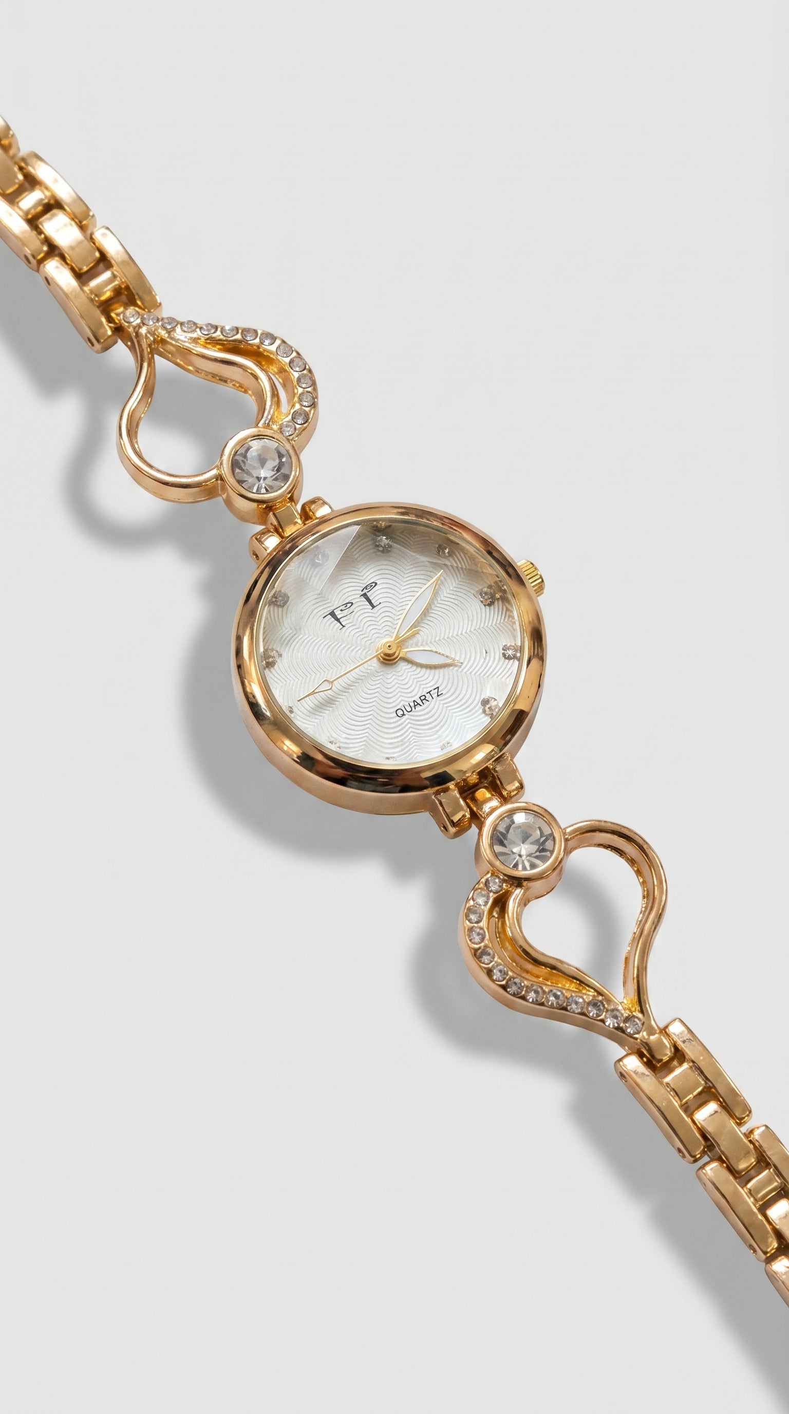 The Lyra Gold Heart Watch